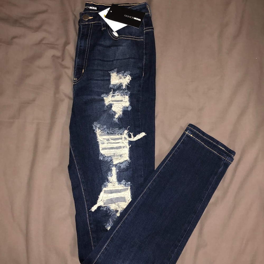 High Rise Distressed Jeans - Picture 2 of 9